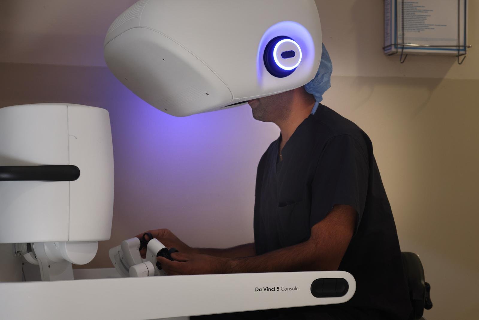 Dr. Dattani at the robotic console